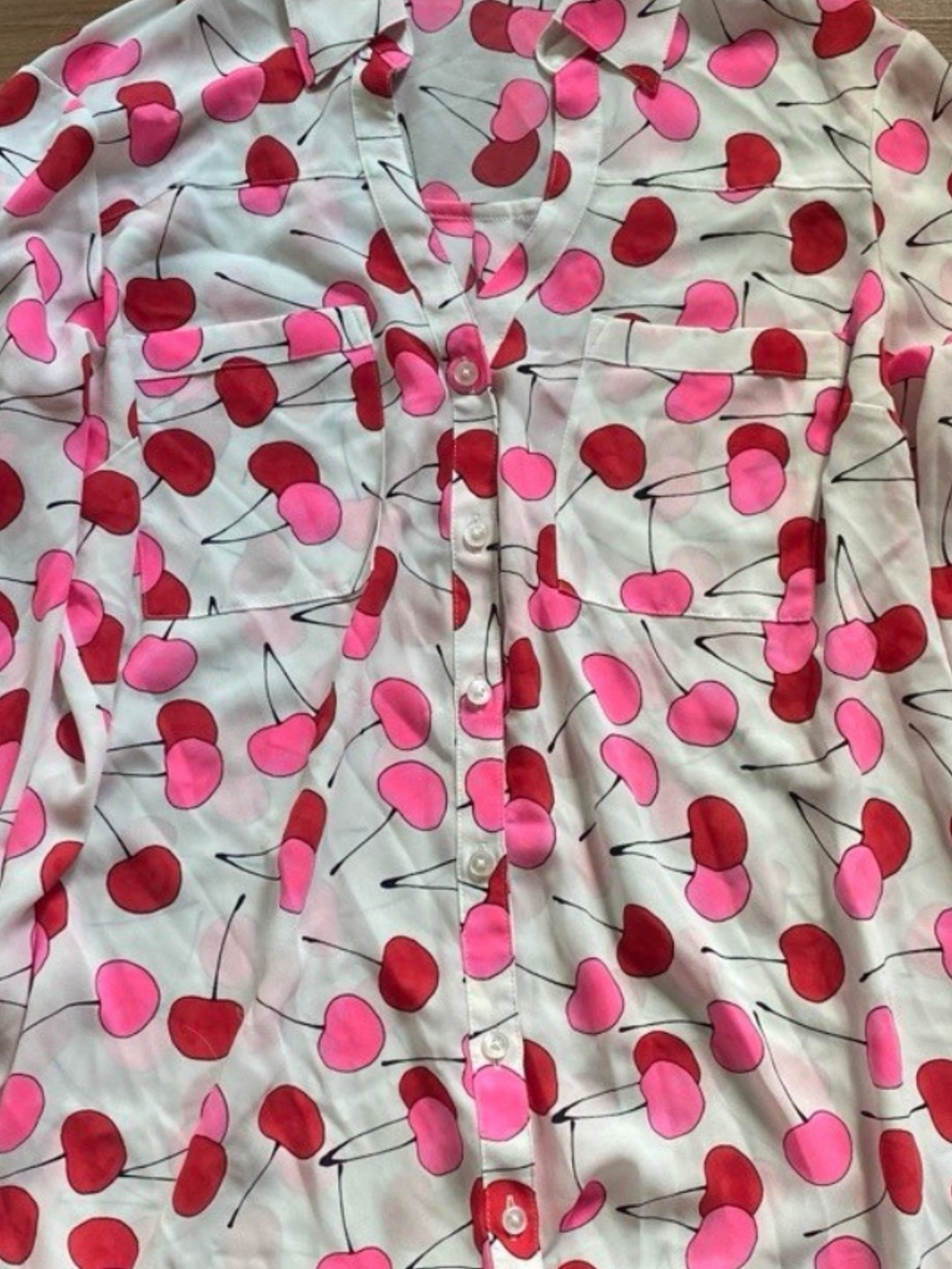 ISO Express White Blouse with Pink and Red Cherry Print. PLEASE HELP